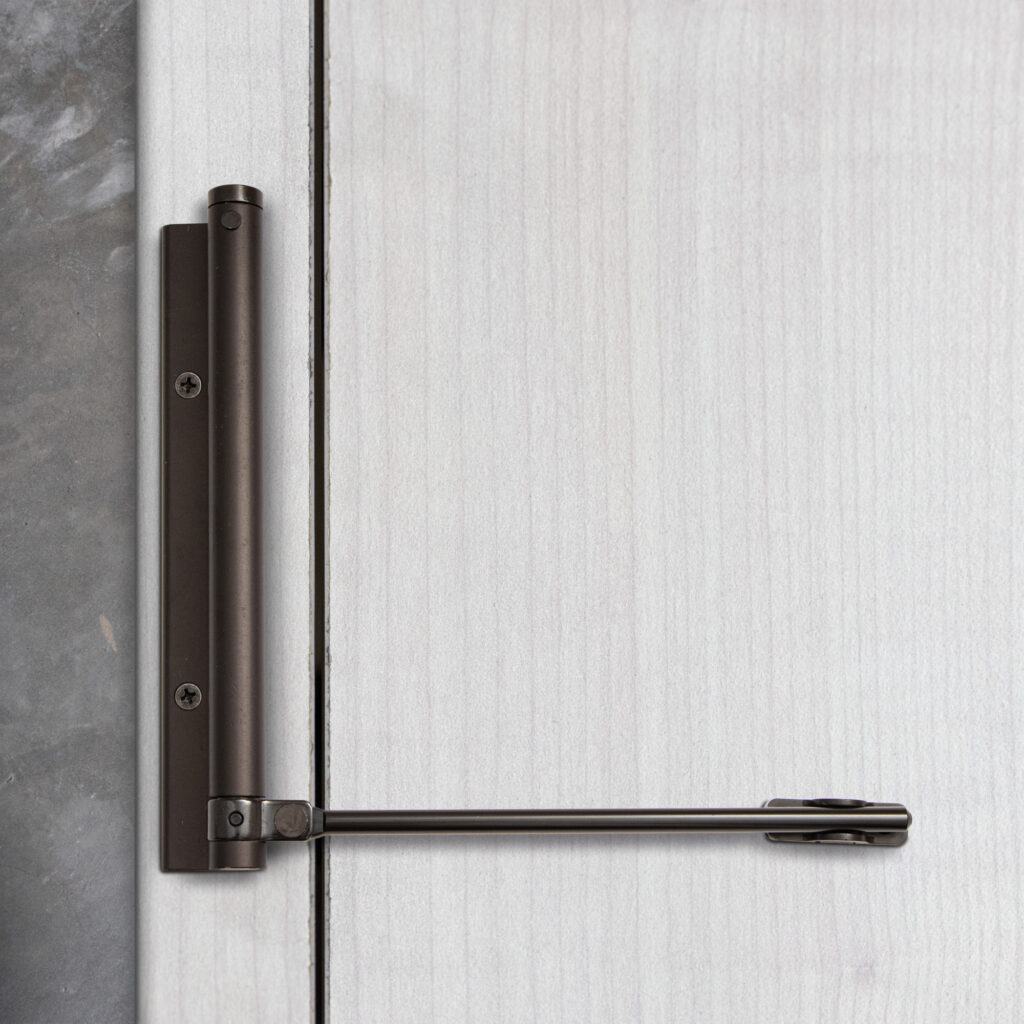 Bras à ressort ferme porte, a corps très fin en Aluminium anodisé noir